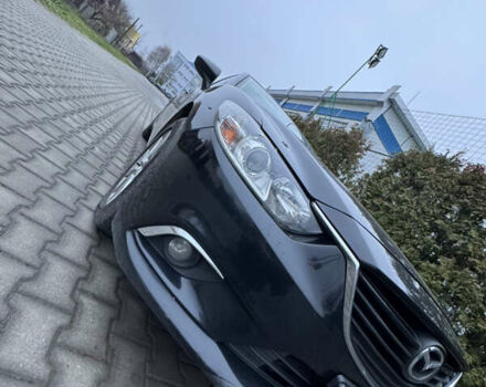 Черный Мазда 6, объемом двигателя 2.2 л и пробегом 325 тыс. км за 13000 $, фото 1 на Automoto.ua