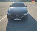 Черный Мазда 6, объемом двигателя 2.49 л и пробегом 103 тыс. км за 13500 $, фото 1 на Automoto.ua