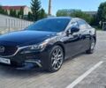 Черный Мазда 6, объемом двигателя 2.49 л и пробегом 210 тыс. км за 11800 $, фото 1 на Automoto.ua