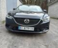 Черный Мазда 6, объемом двигателя 2.5 л и пробегом 205 тыс. км за 11000 $, фото 1 на Automoto.ua