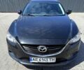 Черный Мазда 6, объемом двигателя 2.5 л и пробегом 208 тыс. км за 10700 $, фото 1 на Automoto.ua