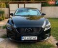 Черный Мазда 6, объемом двигателя 2.19 л и пробегом 180 тыс. км за 13500 $, фото 1 на Automoto.ua