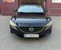 Черный Мазда 6, объемом двигателя 2.49 л и пробегом 317 тыс. км за 10700 $, фото 1 на Automoto.ua