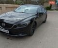 Черный Мазда 6, объемом двигателя 2.49 л и пробегом 247 тыс. км за 11000 $, фото 1 на Automoto.ua