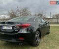 Черный Мазда 6, объемом двигателя 2.49 л и пробегом 141 тыс. км за 13500 $, фото 4 на Automoto.ua