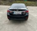 Черный Мазда 6, объемом двигателя 2.49 л и пробегом 168 тыс. км за 12500 $, фото 1 на Automoto.ua