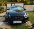 Черный Мазда 6, объемом двигателя 2.2 л и пробегом 180 тыс. км за 14000 $, фото 1 на Automoto.ua