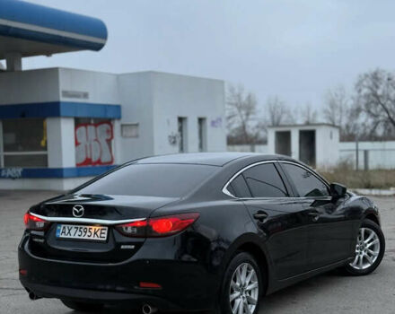Черный Мазда 6, объемом двигателя 2.49 л и пробегом 148 тыс. км за 11000 $, фото 2 на Automoto.ua