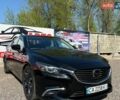 Черный Мазда 6, объемом двигателя 2.49 л и пробегом 136 тыс. км за 16300 $, фото 1 на Automoto.ua