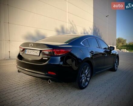 Черный Мазда 6, объемом двигателя 2.5 л и пробегом 77 тыс. км за 13100 $, фото 1 на Automoto.ua