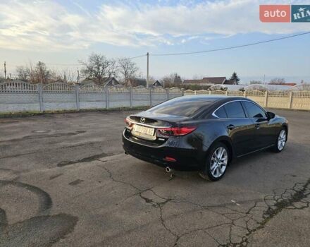 Черный Мазда 6, объемом двигателя 2.49 л и пробегом 178 тыс. км за 13600 $, фото 9 на Automoto.ua
