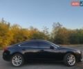 Черный Мазда 6, объемом двигателя 2.49 л и пробегом 83 тыс. км за 13000 $, фото 1 на Automoto.ua