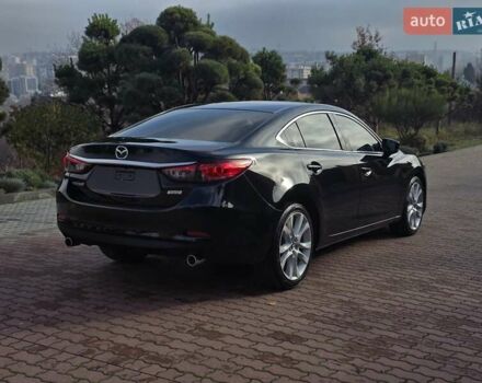 Черный Мазда 6, объемом двигателя 2.5 л и пробегом 70 тыс. км за 12800 $, фото 2 на Automoto.ua