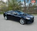 Черный Мазда 6, объемом двигателя 2.5 л и пробегом 220 тыс. км за 12999 $, фото 1 на Automoto.ua