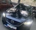 Черный Мазда 6, объемом двигателя 2.49 л и пробегом 76 тыс. км за 13000 $, фото 1 на Automoto.ua