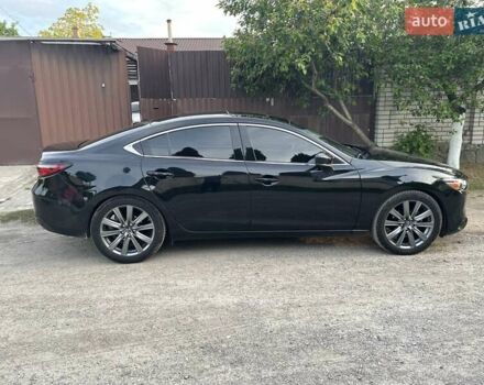 Чорний Мазда 6, об'ємом двигуна 2.49 л та пробігом 128 тис. км за 15999 $, фото 1 на Automoto.ua