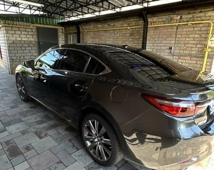 Черный Мазда 6, объемом двигателя 2.49 л и пробегом 125 тыс. км за 19400 $, фото 1 на Automoto.ua