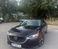 Черный Мазда 6, объемом двигателя 2.5 л и пробегом 148 тыс. км за 16200 $, фото 1 на Automoto.ua