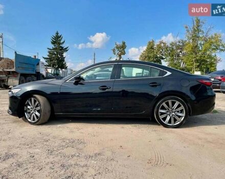 Черный Мазда 6, объемом двигателя 2.49 л и пробегом 141 тыс. км за 19550 $, фото 1 на Automoto.ua