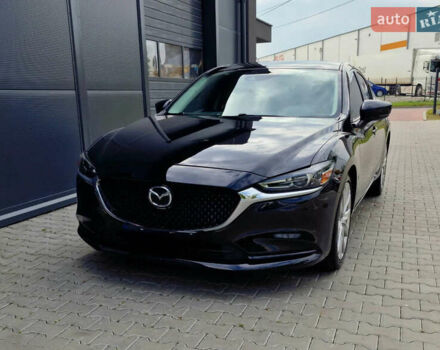 Черный Мазда 6, объемом двигателя 2.49 л и пробегом 100 тыс. км за 15000 $, фото 1 на Automoto.ua