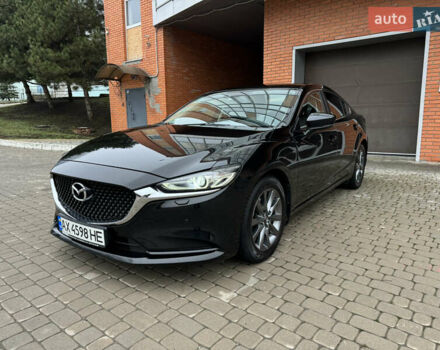 Черный Мазда 6, объемом двигателя 2.5 л и пробегом 70 тыс. км за 18900 $, фото 1 на Automoto.ua
