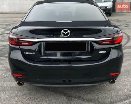 Черный Мазда 6, объемом двигателя 2.49 л и пробегом 66 тыс. км за 15600 $, фото 5 на Automoto.ua