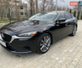 Черный Мазда 6, объемом двигателя 2.49 л и пробегом 109 тыс. км за 16500 $, фото 1 на Automoto.ua