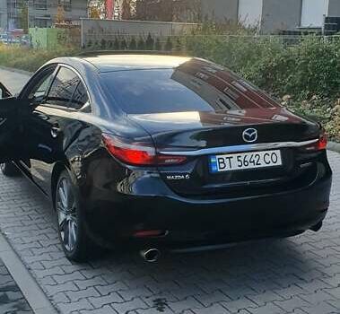 Черный Мазда 6, объемом двигателя 2.5 л и пробегом 90 тыс. км за 19000 $, фото 1 на Automoto.ua
