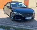 Черный Мазда 6, объемом двигателя 2.49 л и пробегом 97 тыс. км за 18450 $, фото 1 на Automoto.ua