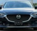 Черный Мазда 6, объемом двигателя 2.5 л и пробегом 58 тыс. км за 11700 $, фото 1 на Automoto.ua