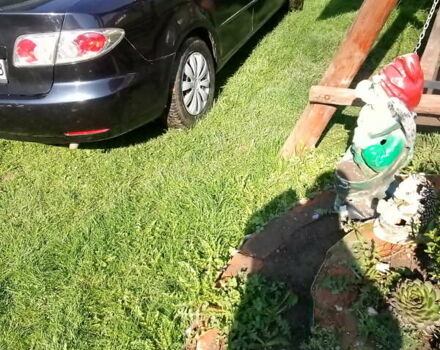 Черный Мазда 6, объемом двигателя 2 л и пробегом 249 тыс. км за 3500 $, фото 1 на Automoto.ua