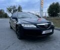 Черный Мазда 6, объемом двигателя 2 л и пробегом 295 тыс. км за 2950 $, фото 1 на Automoto.ua