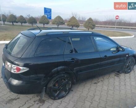 Черный Мазда 6, объемом двигателя 1.99 л и пробегом 417 тыс. км за 2800 $, фото 1 на Automoto.ua