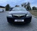 Черный Мазда 6, объемом двигателя 2 л и пробегом 295 тыс. км за 2950 $, фото 1 на Automoto.ua