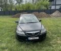 Черный Мазда 6, объемом двигателя 2 л и пробегом 250 тыс. км за 1300 $, фото 1 на Automoto.ua