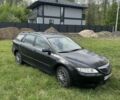 Черный Мазда 6, объемом двигателя 2 л и пробегом 250 тыс. км за 1300 $, фото 1 на Automoto.ua