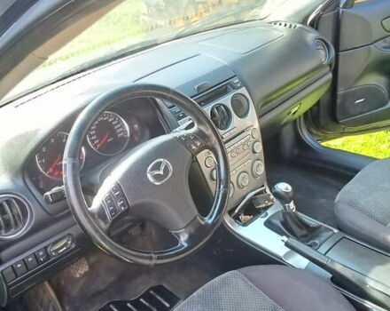 Черный Мазда 6, объемом двигателя 2 л и пробегом 249 тыс. км за 3500 $, фото 5 на Automoto.ua