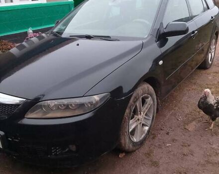 Черный Мазда 6, объемом двигателя 2 л и пробегом 377 тыс. км за 2400 $, фото 1 на Automoto.ua