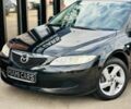 Черный Мазда 6, объемом двигателя 1.8 л и пробегом 299 тыс. км за 3899 $, фото 1 на Automoto.ua
