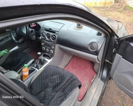 Черный Мазда 6, объемом двигателя 2 л и пробегом 362 тыс. км за 2601 $, фото 5 на Automoto.ua