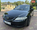 Чорний Мазда 6, об'ємом двигуна 2 л та пробігом 220 тис. км за 2699 $, фото 6 на Automoto.ua