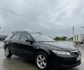Черный Мазда 6, объемом двигателя 2 л и пробегом 270 тыс. км за 3723 $, фото 1 на Automoto.ua