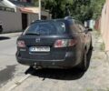 Чорний Мазда 6, об'ємом двигуна 2 л та пробігом 180 тис. км за 2004 $, фото 2 на Automoto.ua