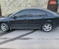 Черный Мазда 6, объемом двигателя 1.8 л и пробегом 272 тыс. км за 3800 $, фото 1 на Automoto.ua