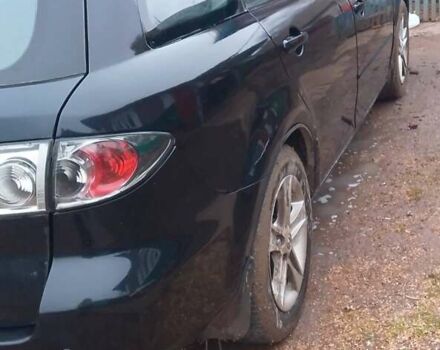 Черный Мазда 6, объемом двигателя 2 л и пробегом 377 тыс. км за 2400 $, фото 2 на Automoto.ua