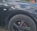 Черный Мазда 6, объемом двигателя 2 л и пробегом 318 тыс. км за 3999 $, фото 1 на Automoto.ua