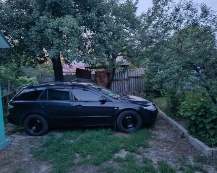 Черный Мазда 6, объемом двигателя 2 л и пробегом 362 тыс. км за 2601 $, фото 1 на Automoto.ua