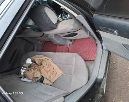 Черный Мазда 6, объемом двигателя 2 л и пробегом 362 тыс. км за 2601 $, фото 4 на Automoto.ua