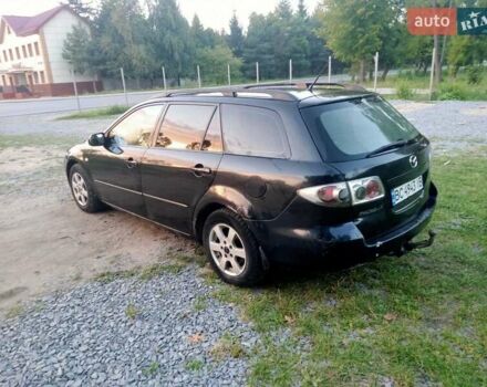 Черный Мазда 6, объемом двигателя 2 л и пробегом 445 тыс. км за 1750 $, фото 2 на Automoto.ua