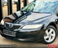 Черный Мазда 6, объемом двигателя 1.8 л и пробегом 299 тыс. км за 3900 $, фото 1 на Automoto.ua